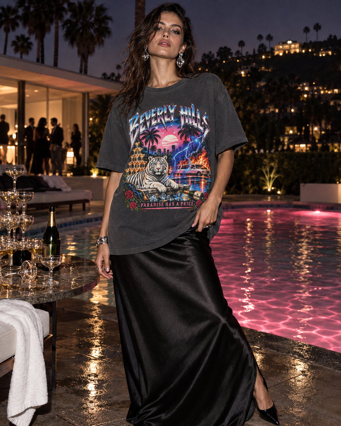 Paradise Has a Price Beverly Hills tiger graphic tee — worn by model beside a pool