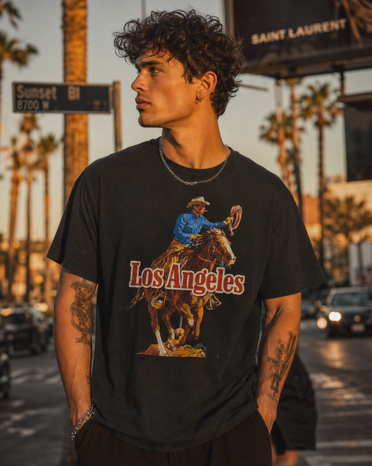Sunset Strip Classic Los Angeles cowboy graphic tee — black, styled on model indoors